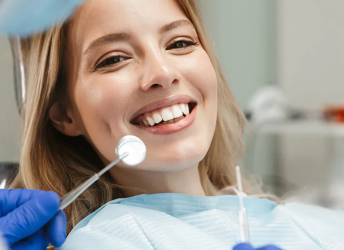 dental-checkup-patient-smile.webp